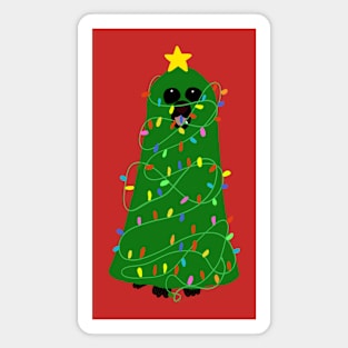 Black dog disguise as christmas tree Magnet